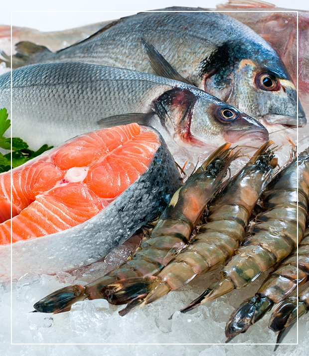 Fresh seafood on ice: salmon, fish, shrimp.